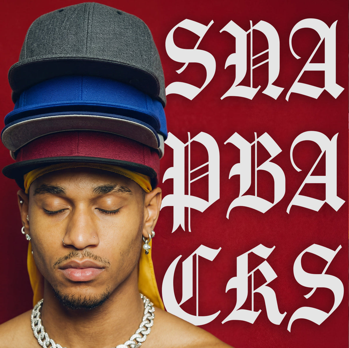 multiple snapback hats stacked on top of each other