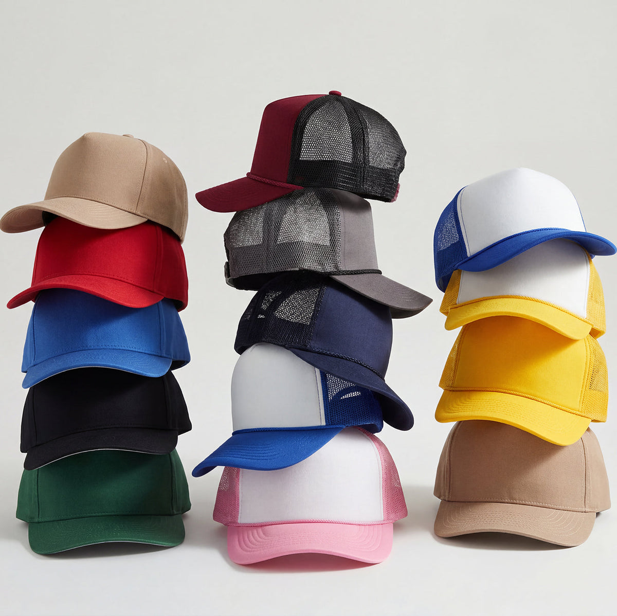 collection of multiple types and colors of trucker hats